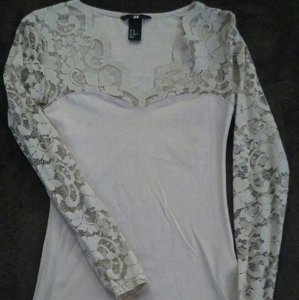 Rose colored long sleeve top.